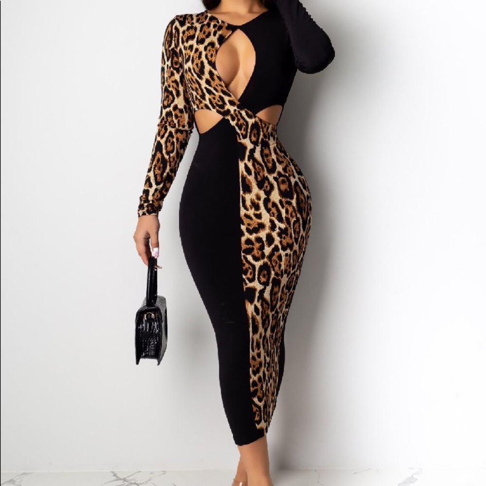 Chic Leopard/ Black Dress with Cross Cross bust.